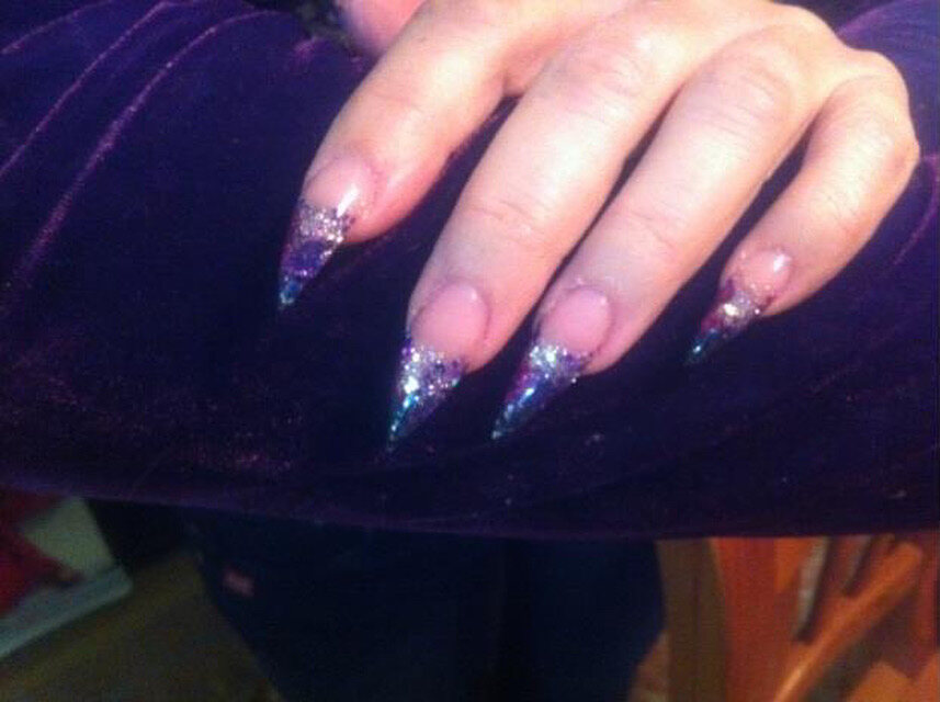 Blue and silver glitter stiletto nails by Beauty On The Move
